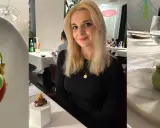 Kobieta w eleganckiej restauracji z gwiazdką Michelin w Polsce. Na stole wykwintne dania i napoje.